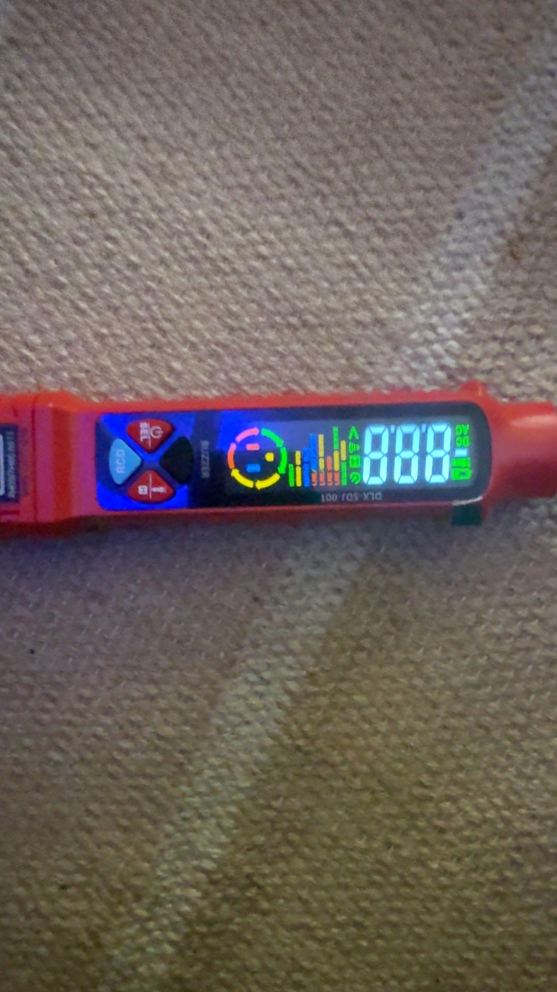 Customer photo of outlet circuit and voltage tester pen display