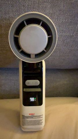 Customer photo for BOGO Handheld Cooling Fan, 5-Speed 4000mAh Rechargeable