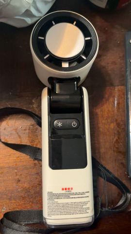 Customer photo for BOGO Handheld Cooling Fan, 5-Speed 4000mAh Rechargeable
