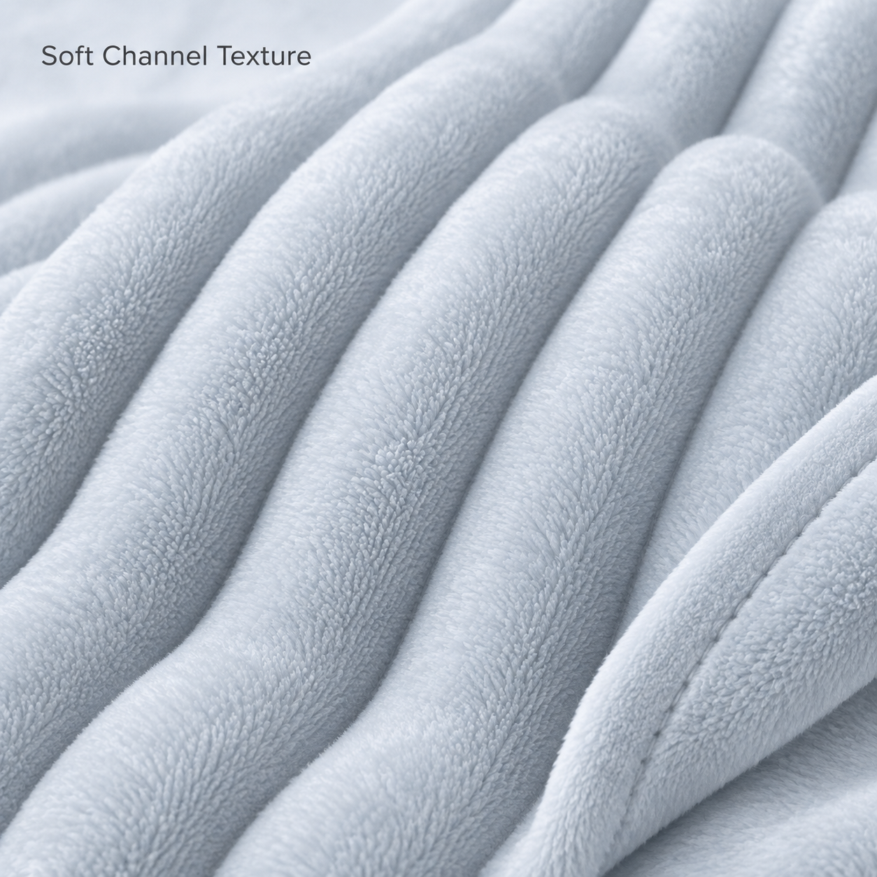 close view of soft raised channel texture short microfiber pile and narrow stitched hem