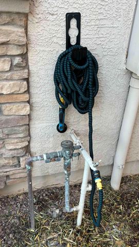 Customer photo for 100FT Heavy Duty Expandable Garden Water Hose 4-Pack