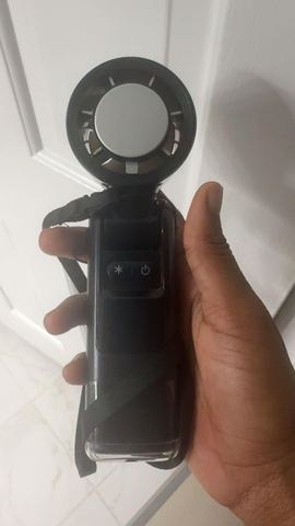 Customer photo for BOGO Handheld Cooling Fan, 5-Speed 4000mAh Rechargeable