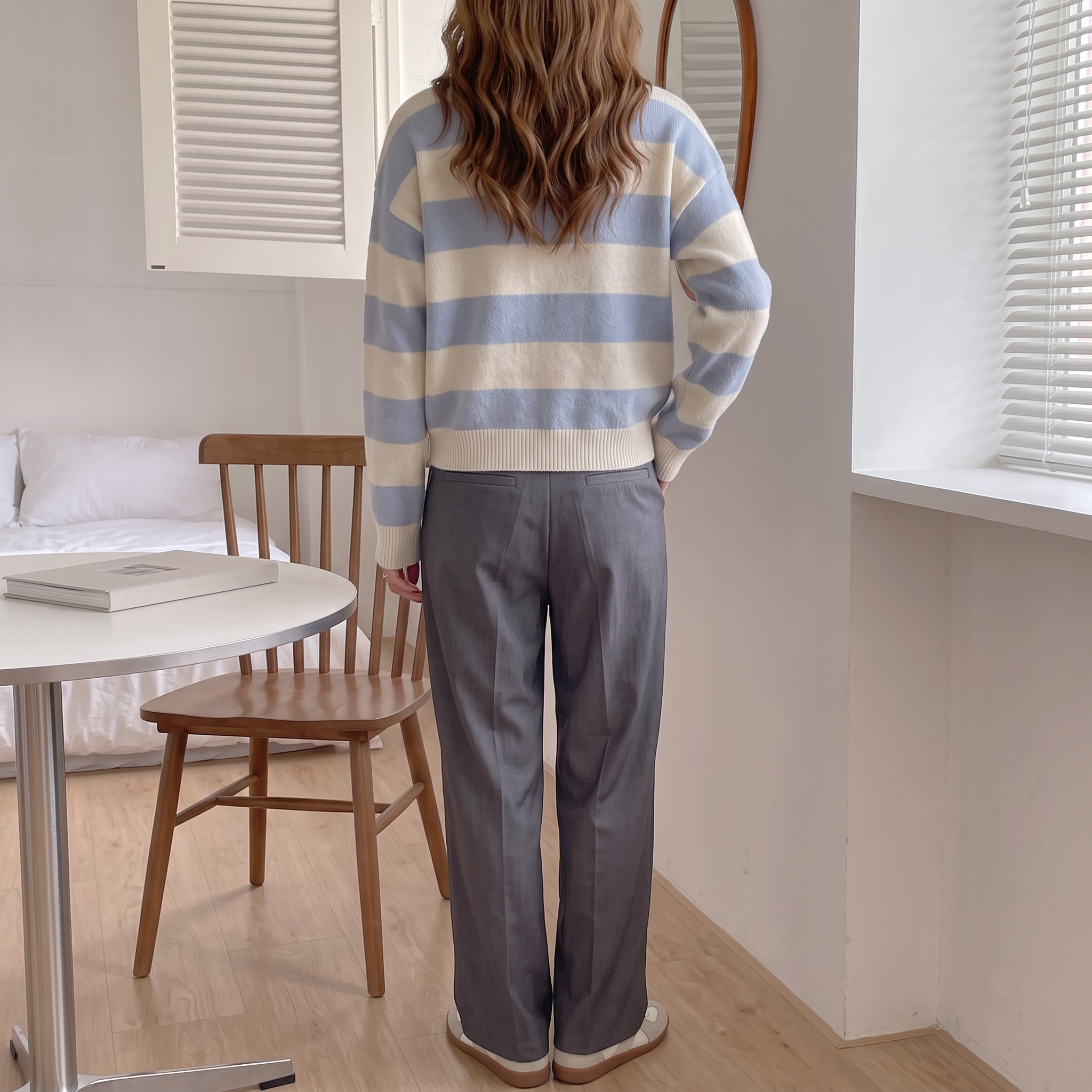 Striped, loose-fitting, drop-shoulder sweater; long-sleeved top; autumn clothing.