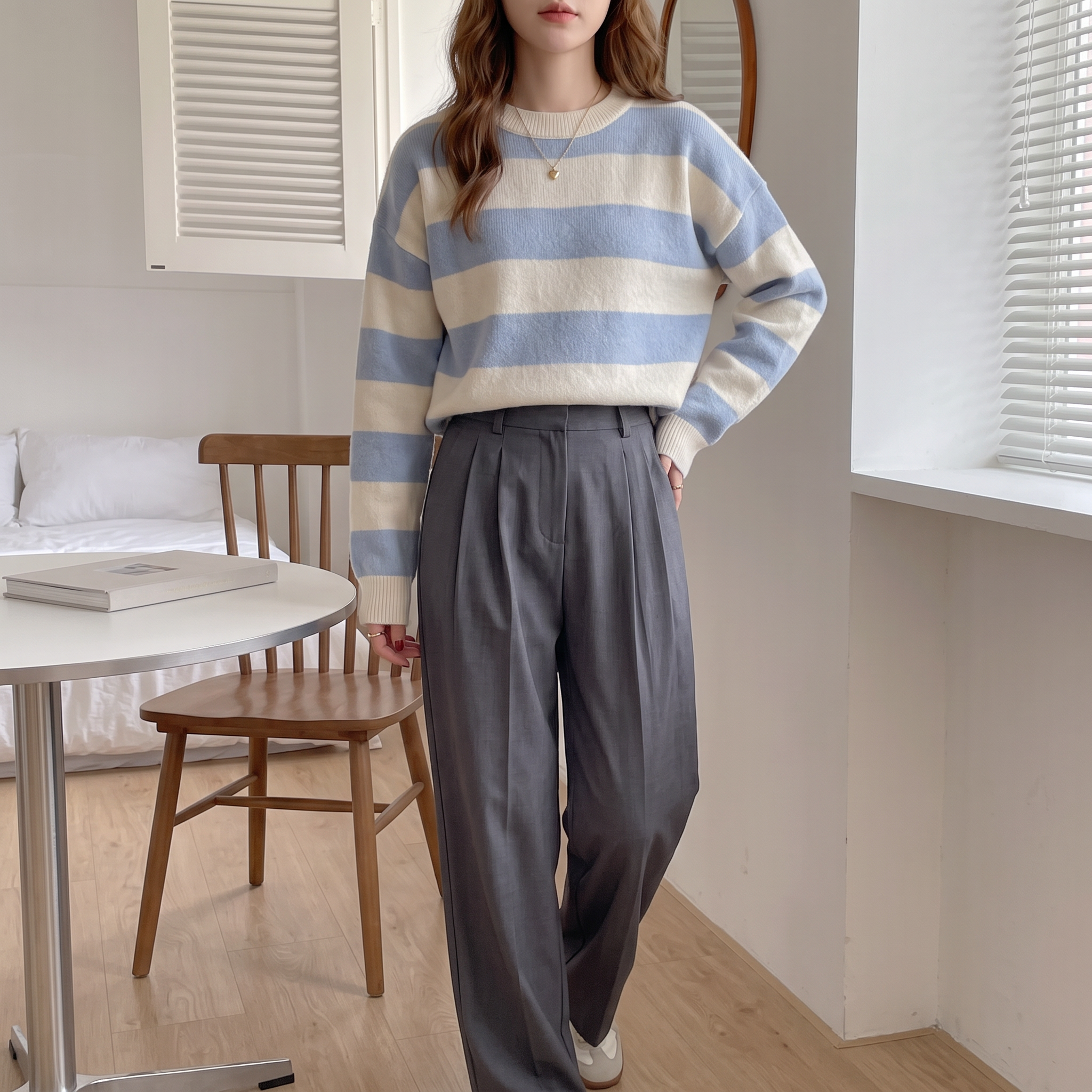 Striped, loose-fitting, drop-shoulder sweater; long-sleeved top; autumn clothing.