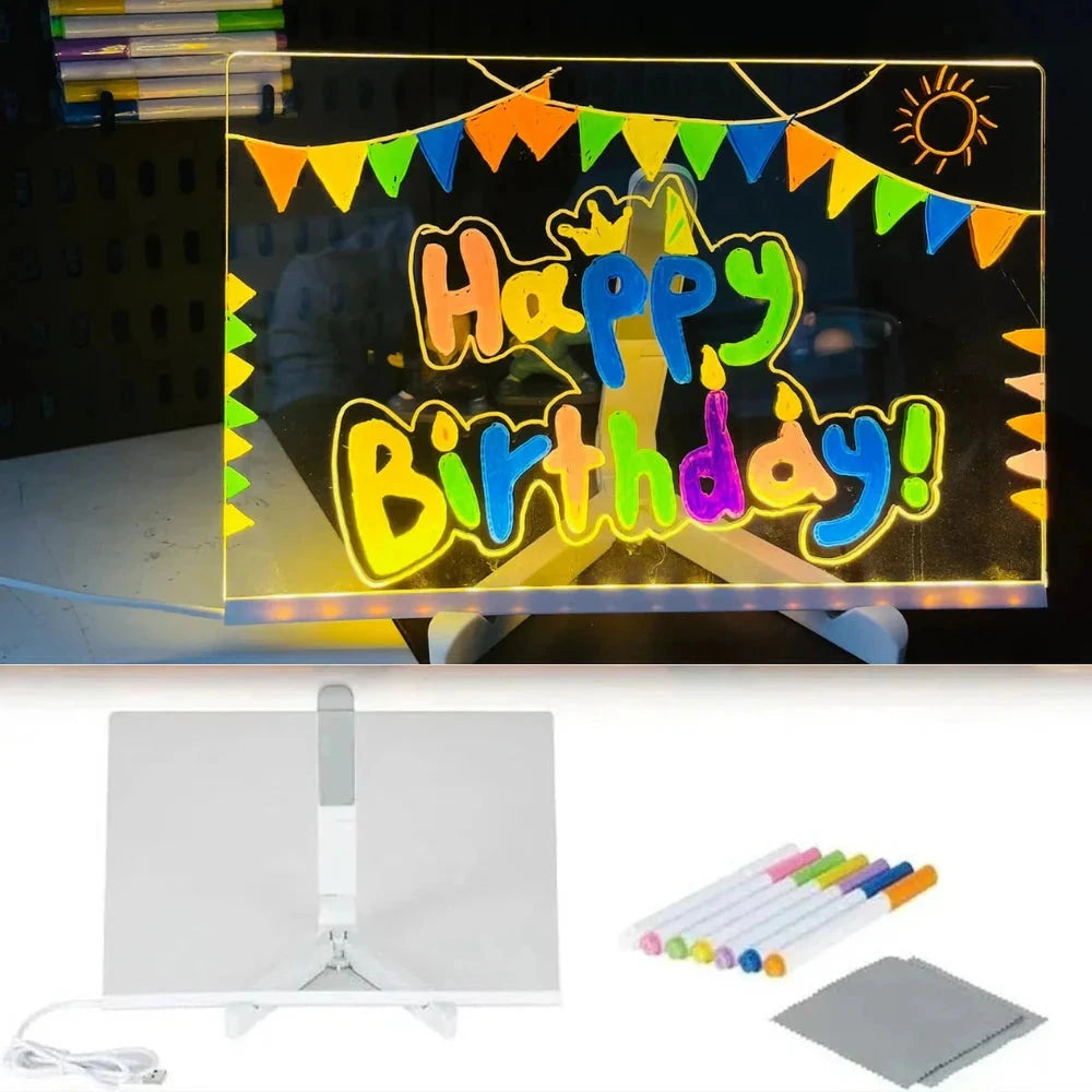 LED drawing board set with coloured markers laid out on a table