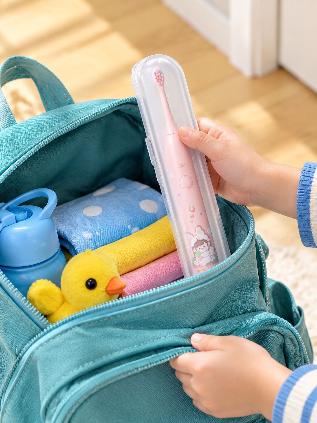 Child using Oaks electric toothbrush for oral hygiene