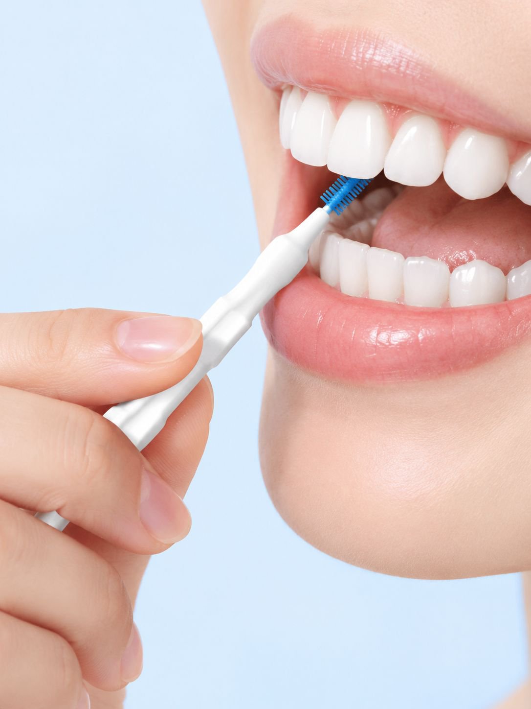 Disposable interdental brushes for cleaning between teeth