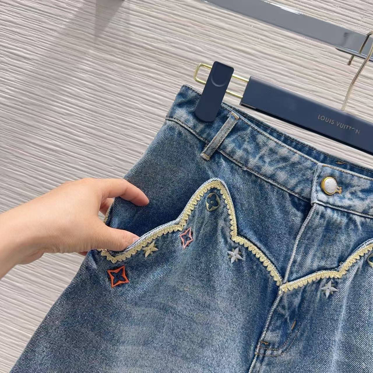 LU Vintage-Wash Embroidered Denim Hot Pants.