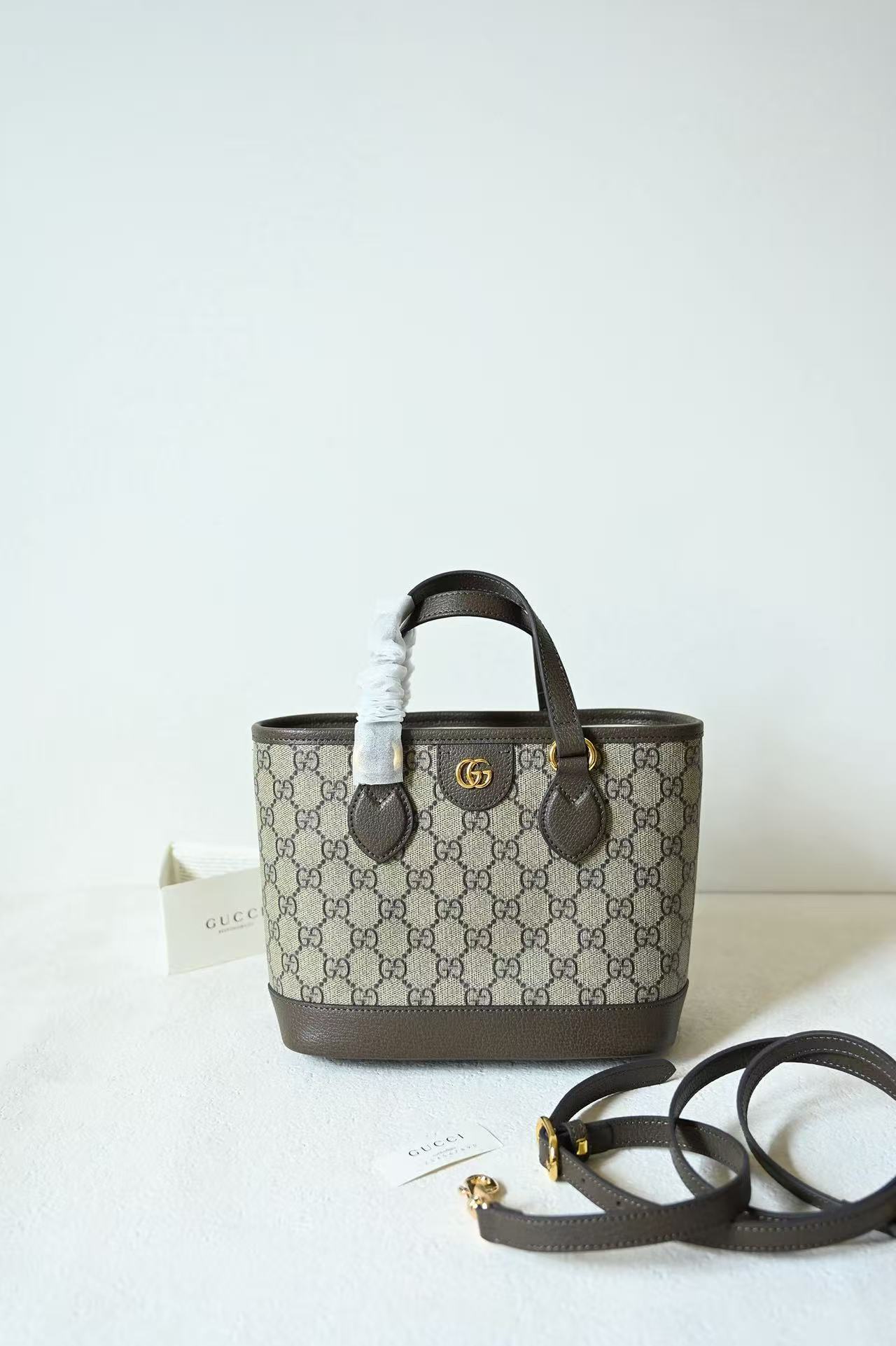 GU  Mini All Over Interlocking Print Tote Bag With Detachable Crossbody Strap