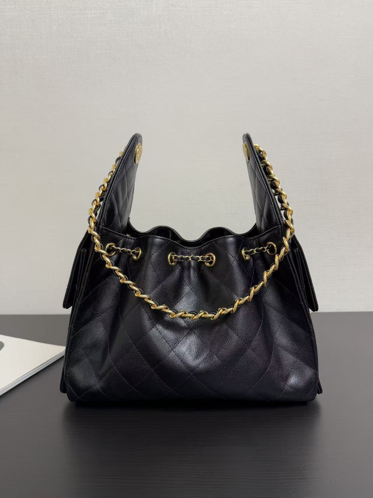 CC26SS Mini Caviar Drawstring Bucket Bag