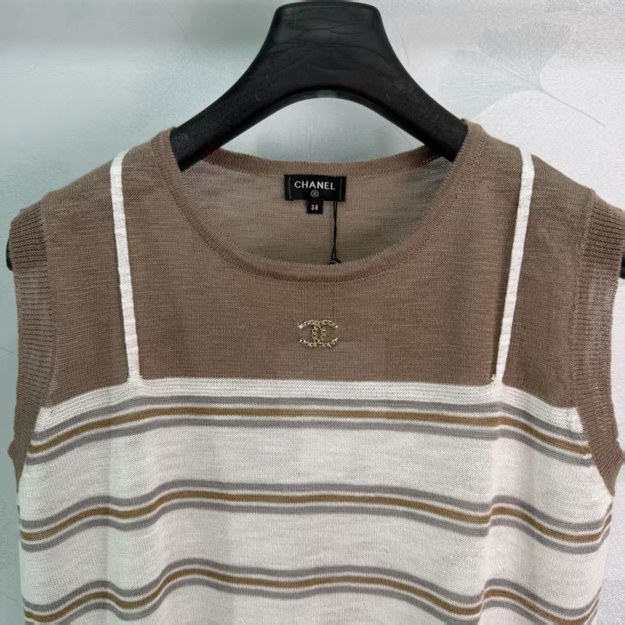 Cha* Striped Knit Vest, made of soft knit material