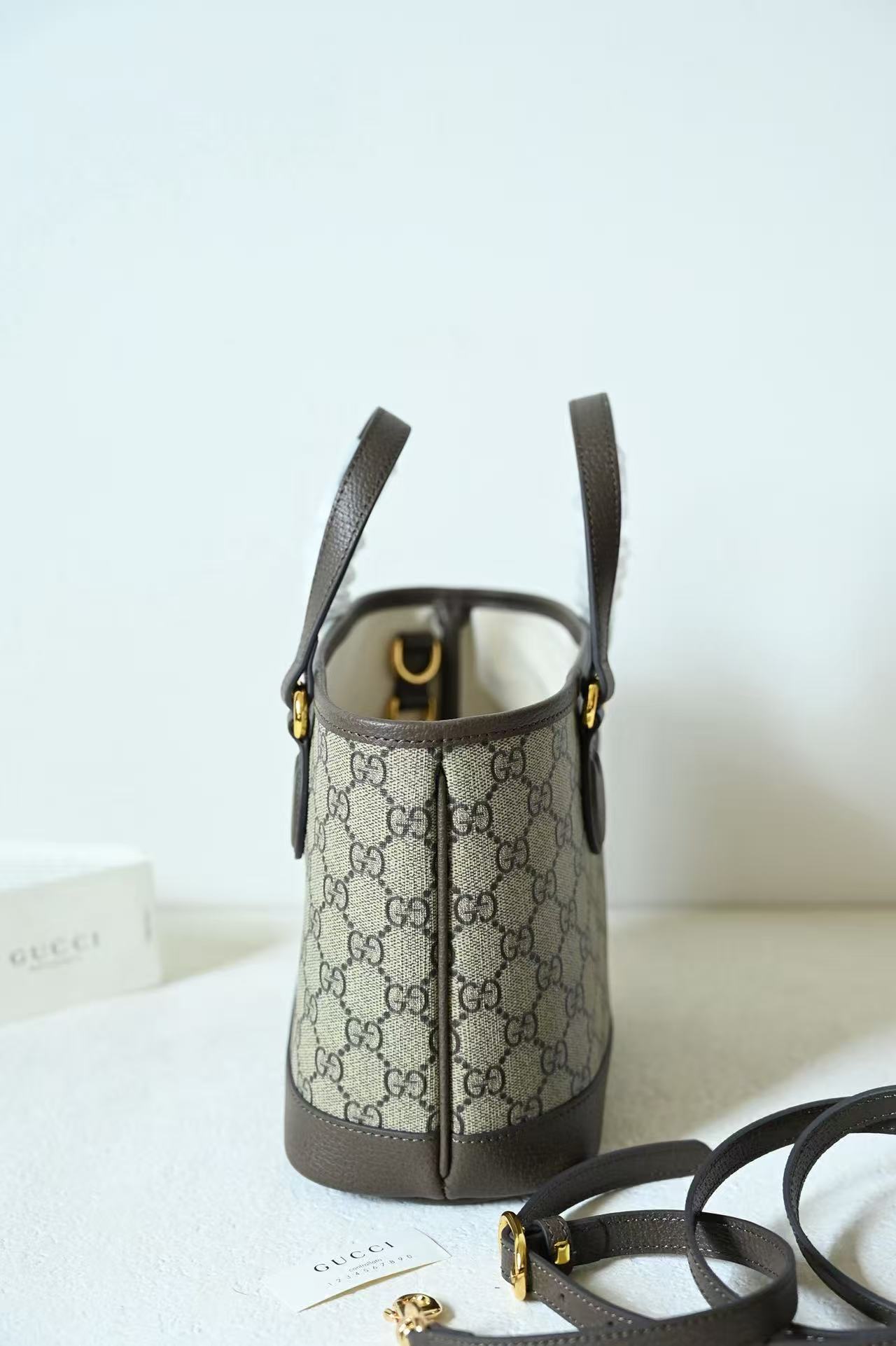 GU  Mini All Over Interlocking Print Tote Bag With Detachable Crossbody Strap