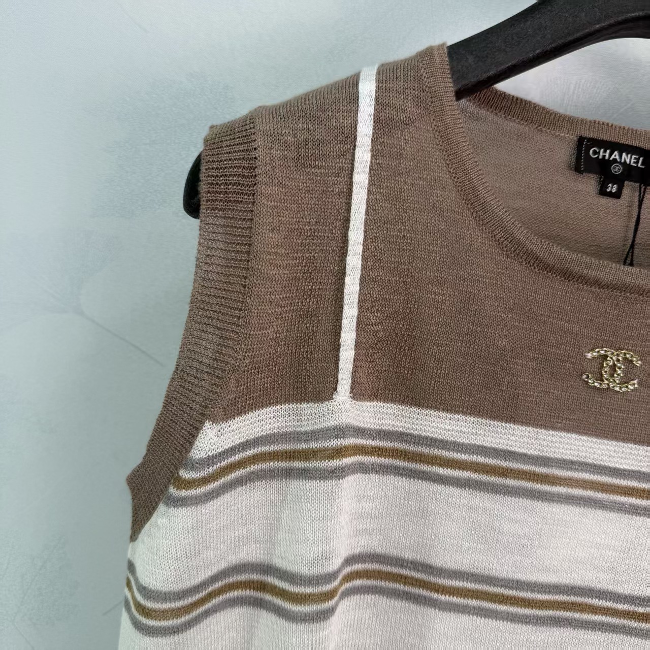 Cha* Striped Knit Vest, made of soft knit material