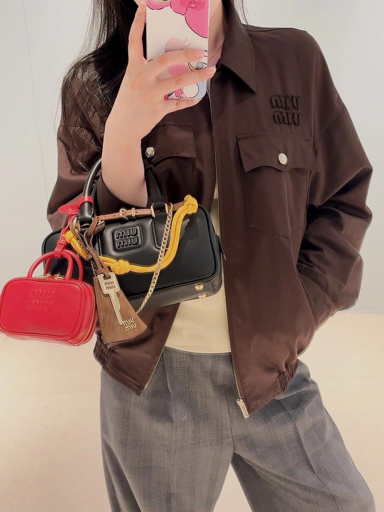 Mi dark brown utility zip-up jacketI paired withmatching tone-on-tone skirt