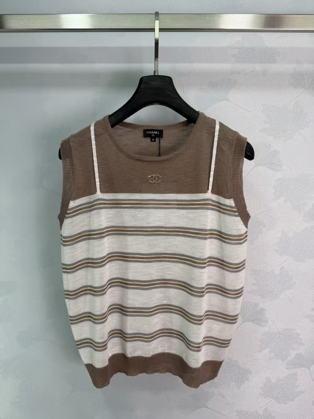 Cha* Striped Knit Vest, made of soft knit material