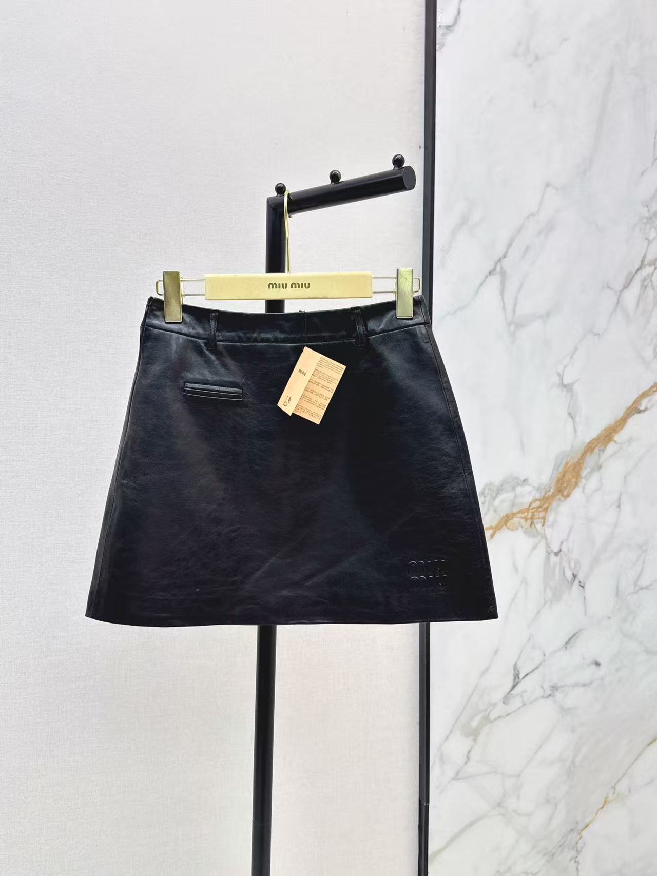 M series Pocket Detail Short Leather Mini Skirt