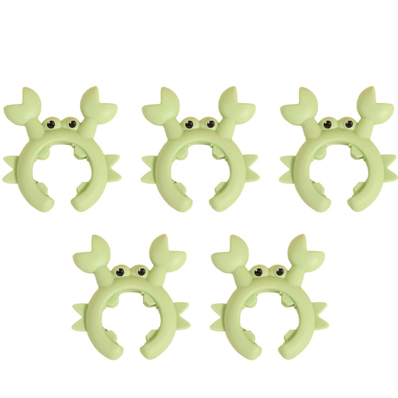 Five green crab silicone utensil holders