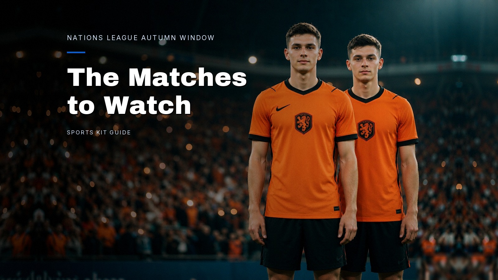 Two players in Netherlands home shirts facing the camera on a floodlit pitch