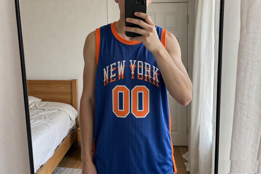 the blue jersey in a bedroom mirror selfie