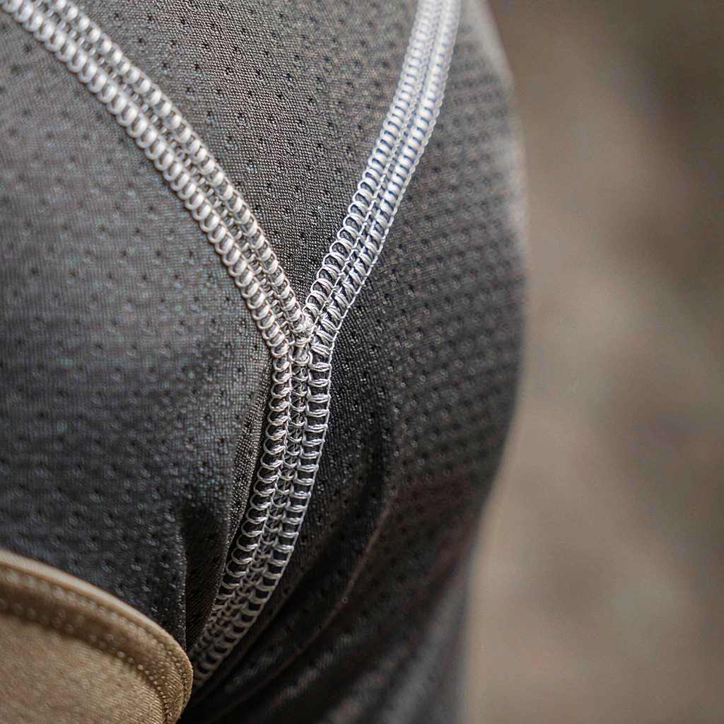 Close-up of American football jersey fabric and stitched seam detail