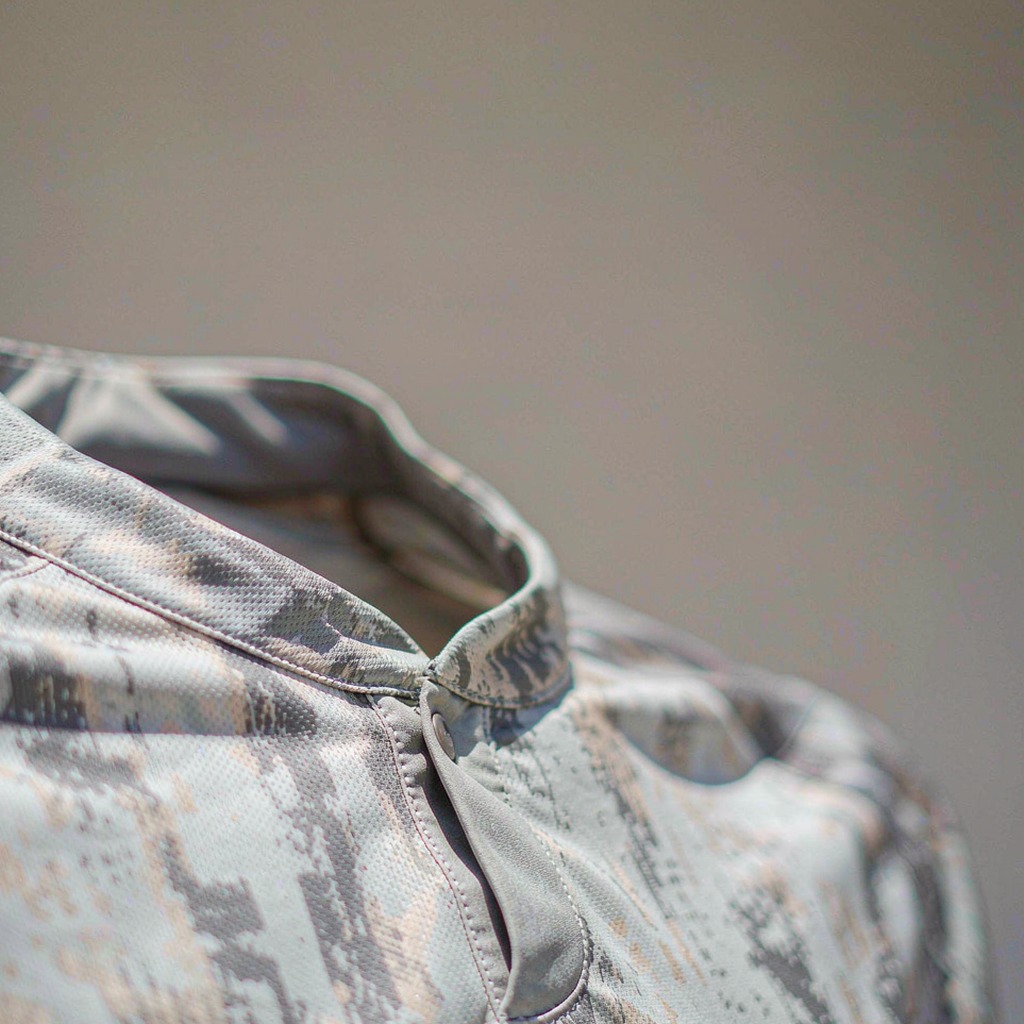 Detail of football shirt collar and stitched placket