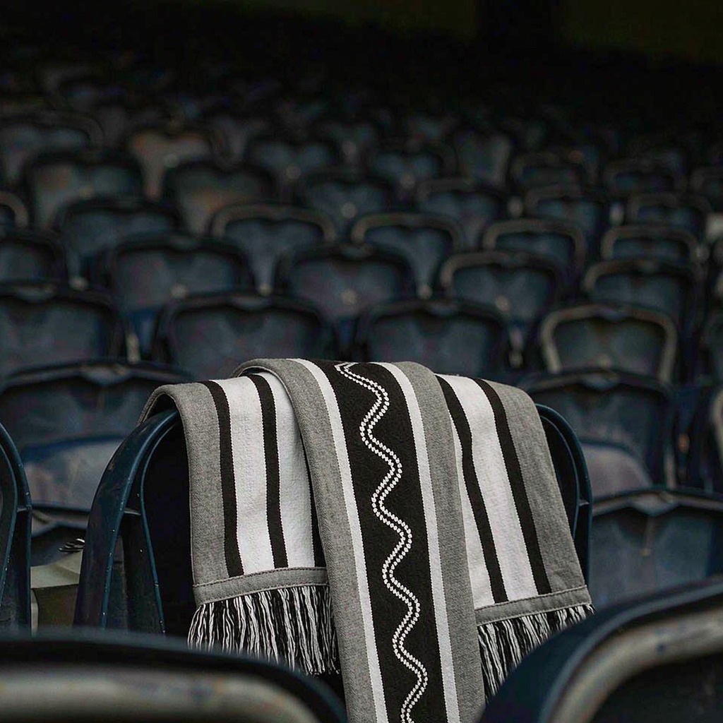 Scarves draped over stadium seats before kick-off