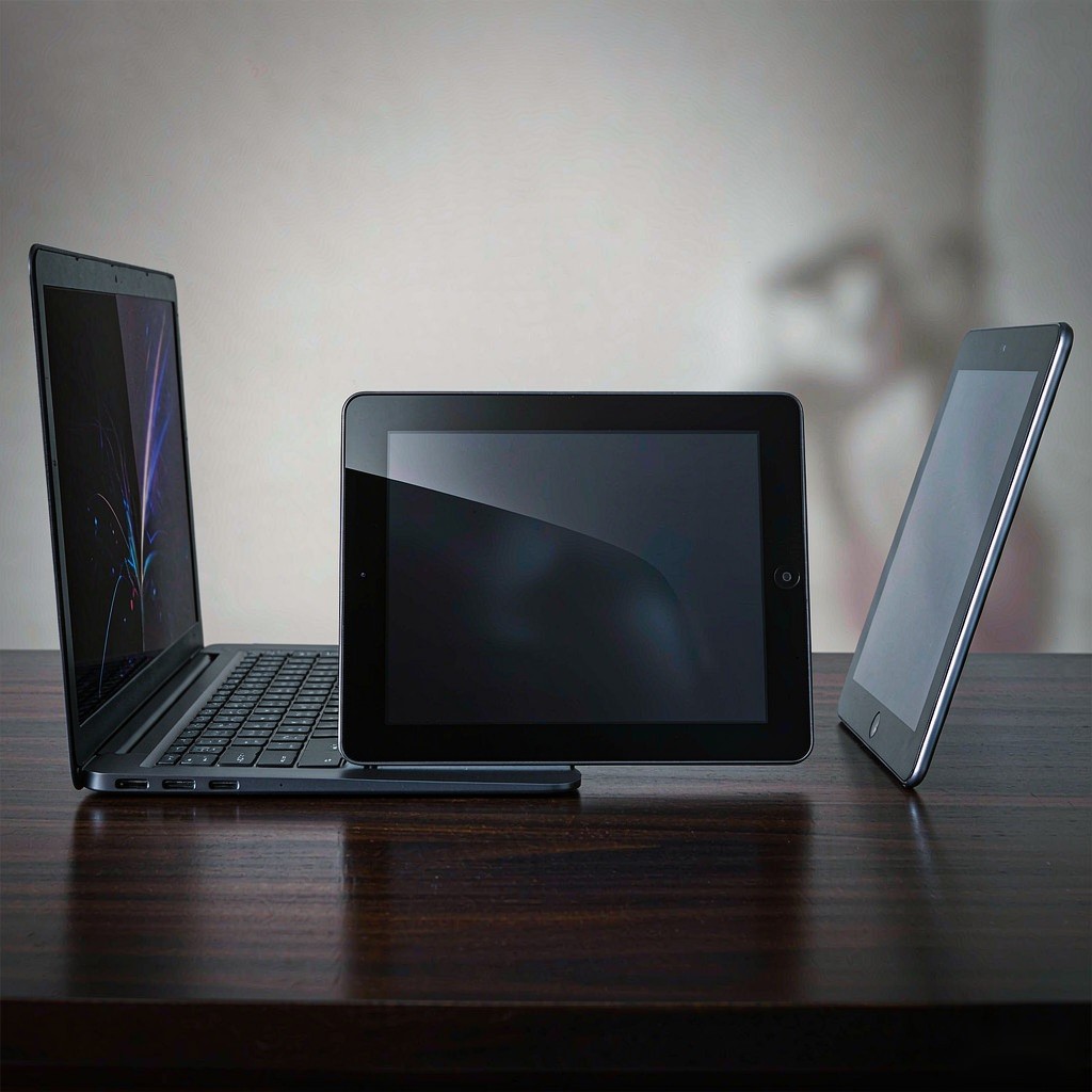 Laptop tablet and phone arranged for streaming