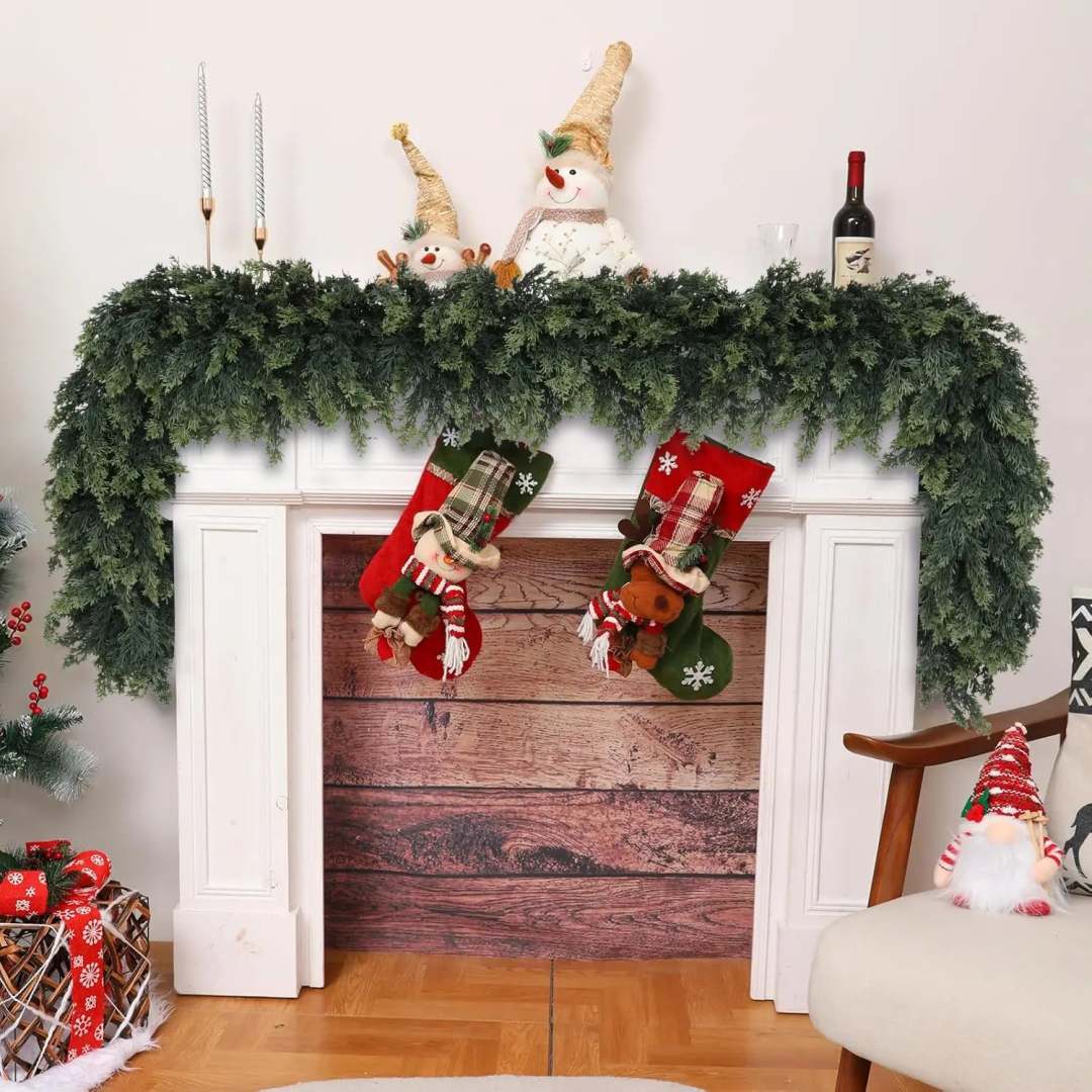 Cedar garland draped across a mantel with Christmas decorations