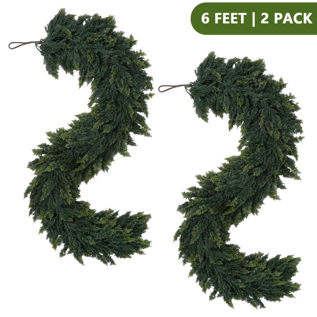 Two separate artificial cedar garlands, each approximately 180 cm or 6 ft long
