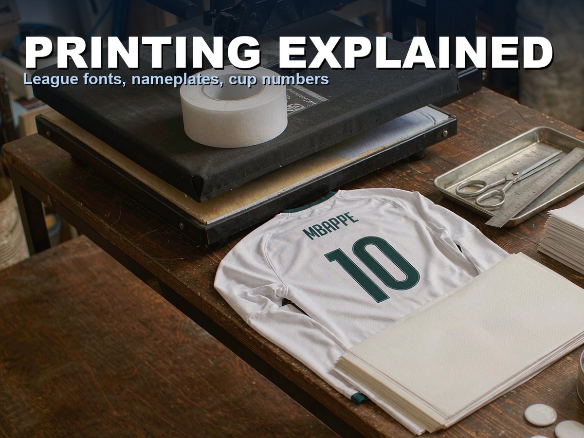 A white Real Madrid shirt printed MBAPPE 10 lying on a workshop table beside a heat press, blank transfer sheets and nameplate strips