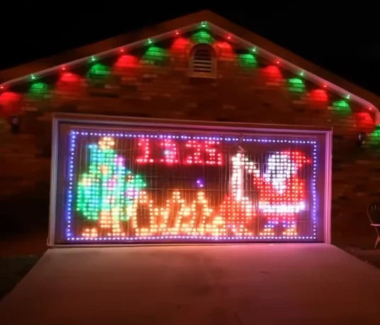 Colourful Christmas pixel curtain on a house