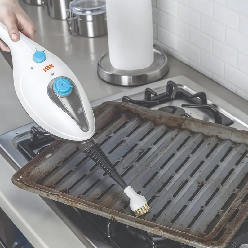 Detachable handheld steam cleaner with detail brush