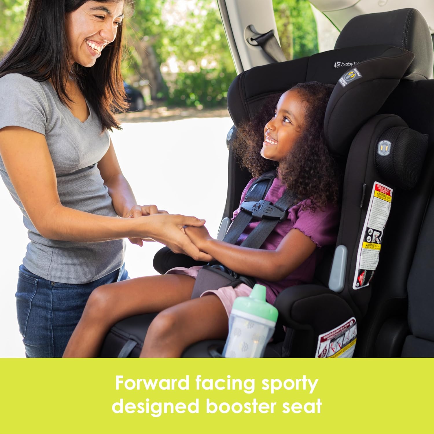 Child secured in Hybrid SI booster seat