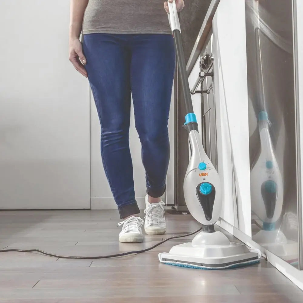 Steam mop angular floorhead cleaning along an edge