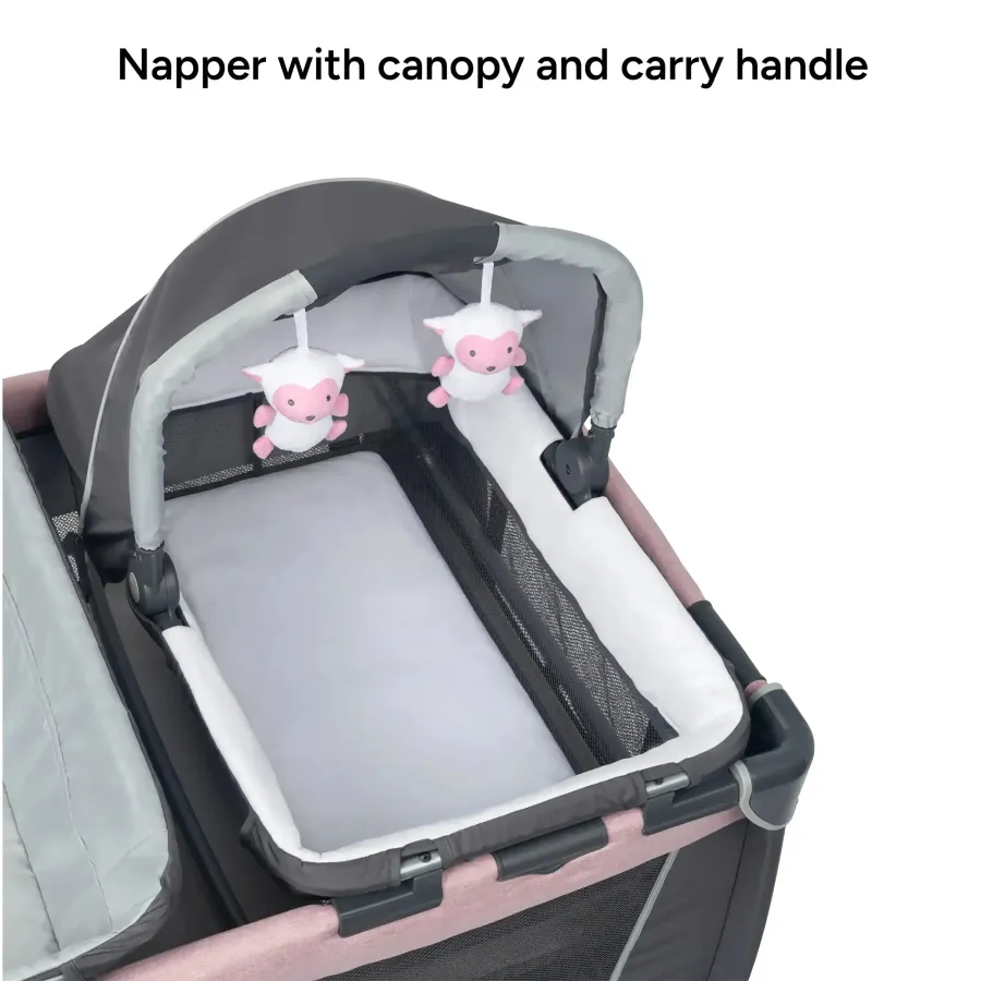 Close-up of the removable bassinet with canopy, mesh sides and carry handle