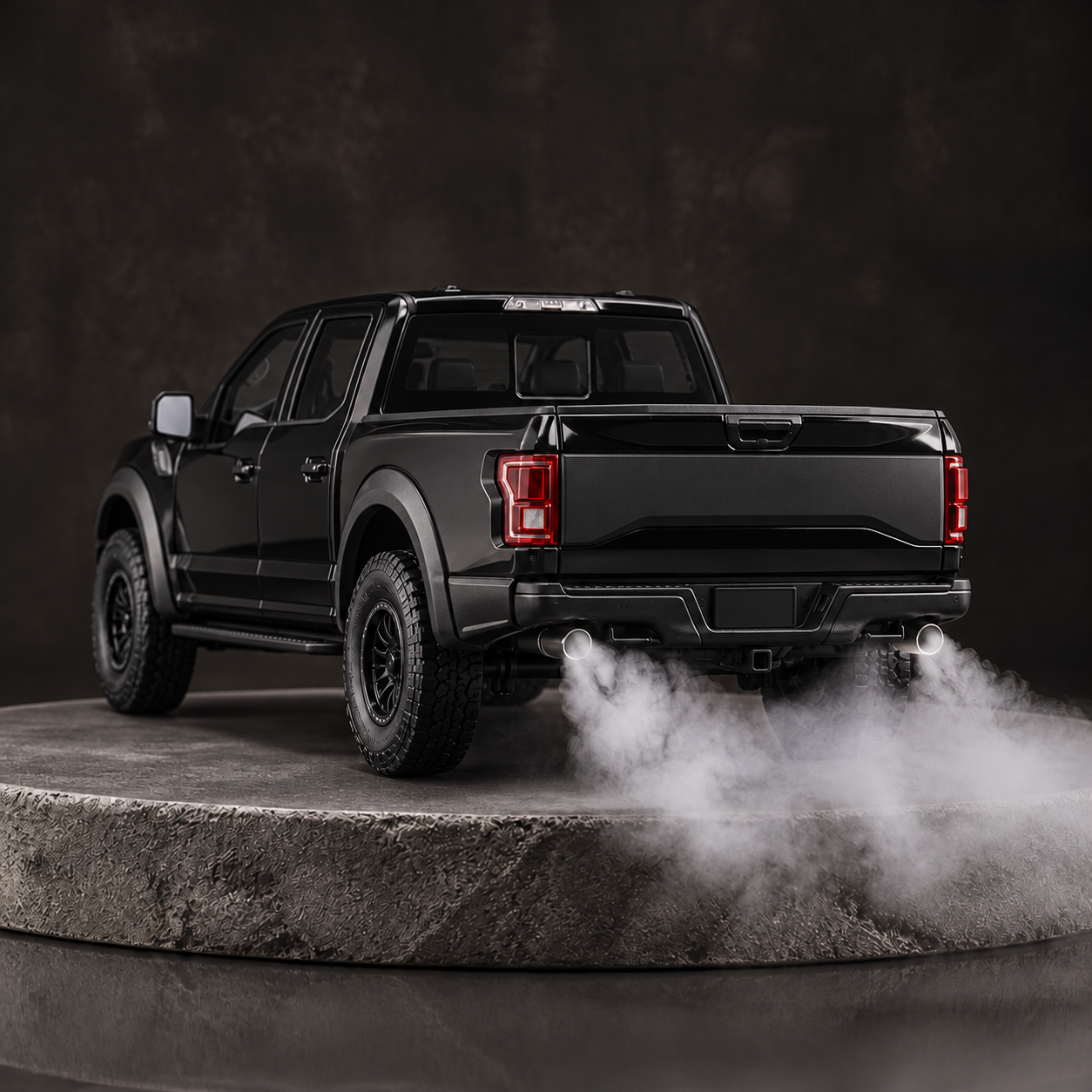 Black Raptor truck diffuser, rear view with tailpipe mist