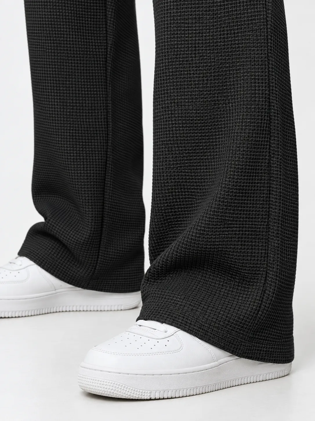 Straight-leg drape and hem detail