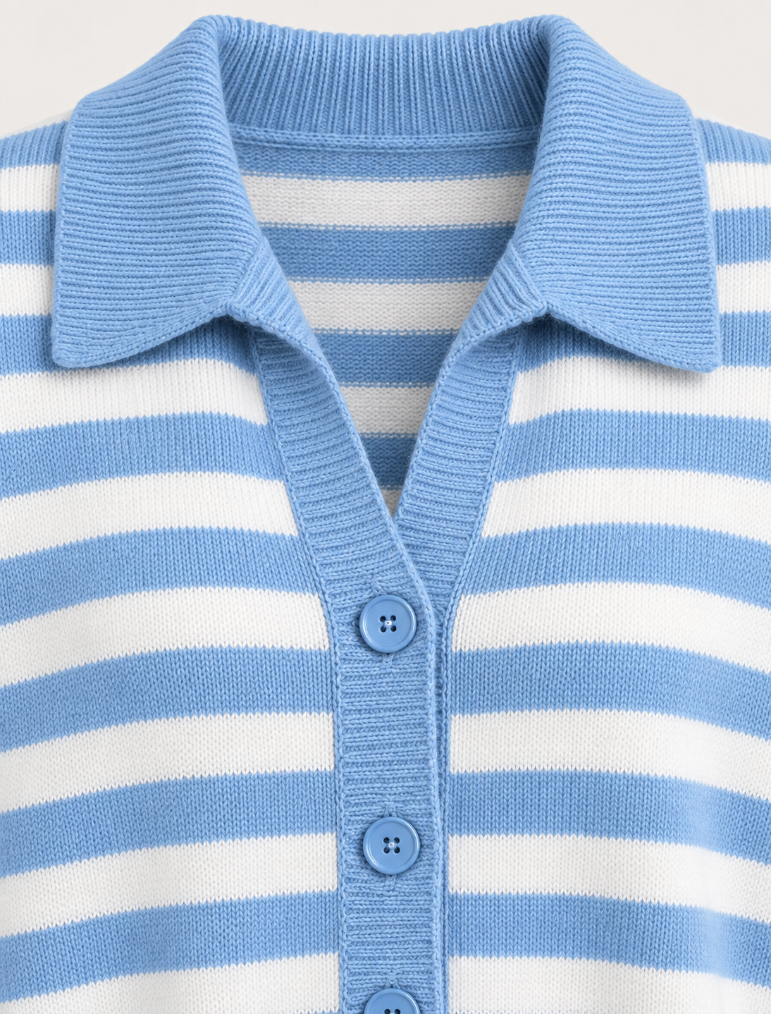 Wide rib-knit collar and button detail