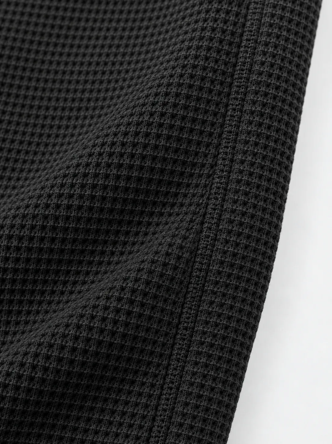 Waffle fabric texture and seam detail