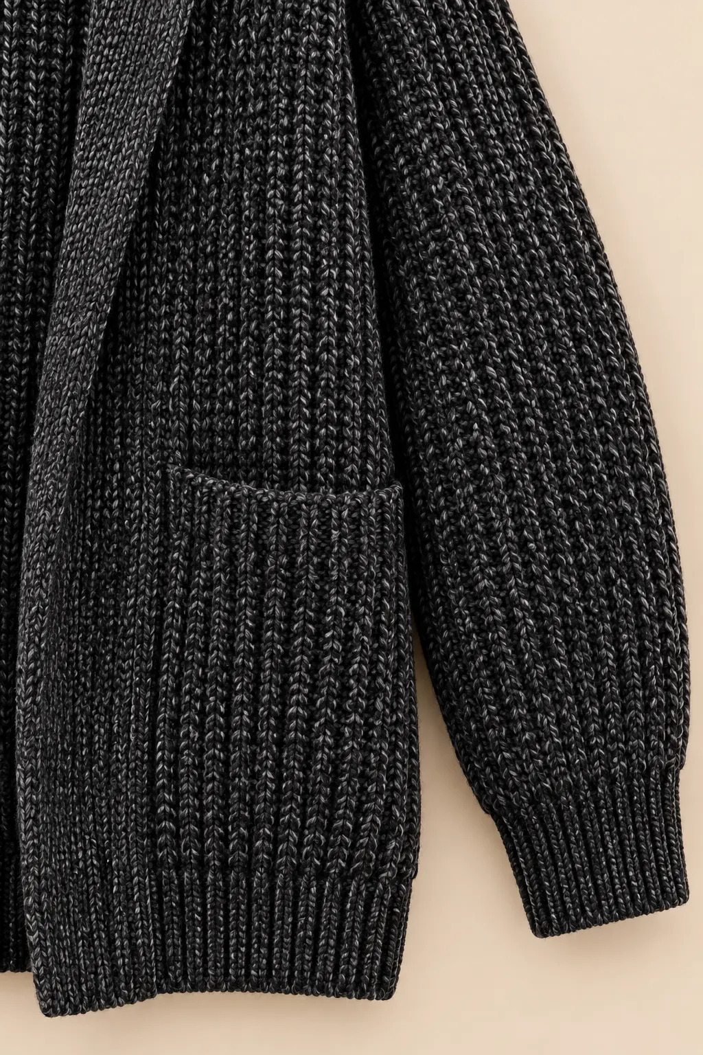 Knit cardigan cuff and pocket detail