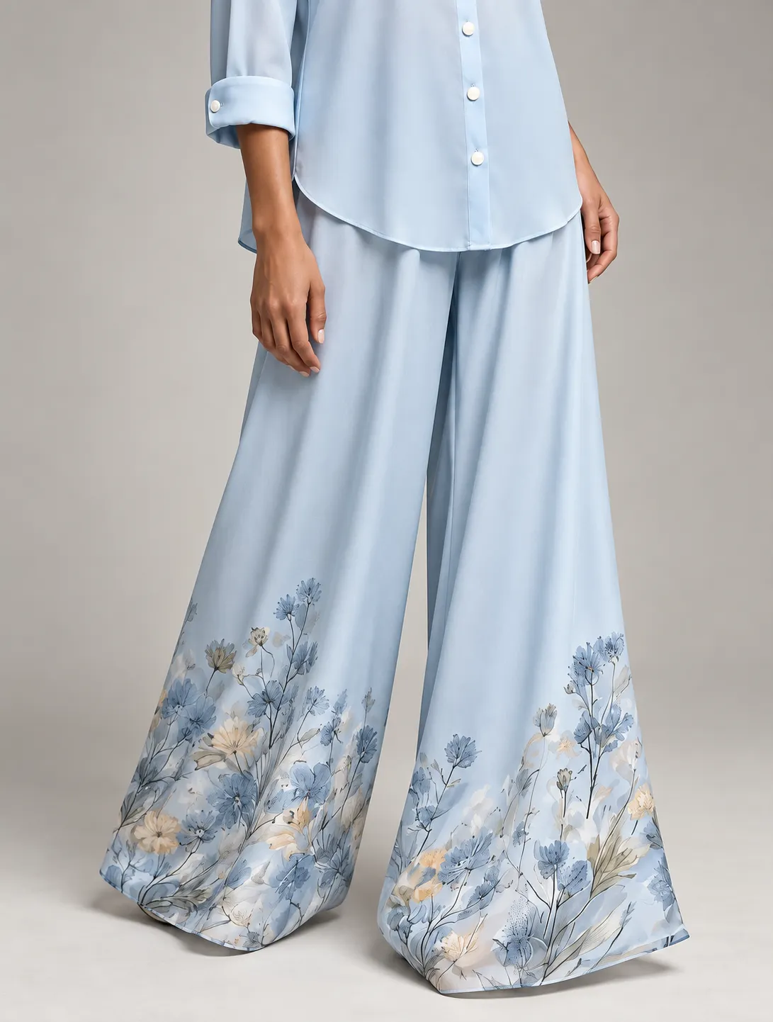 Button-front shirt and botanical wide-leg trouser detail