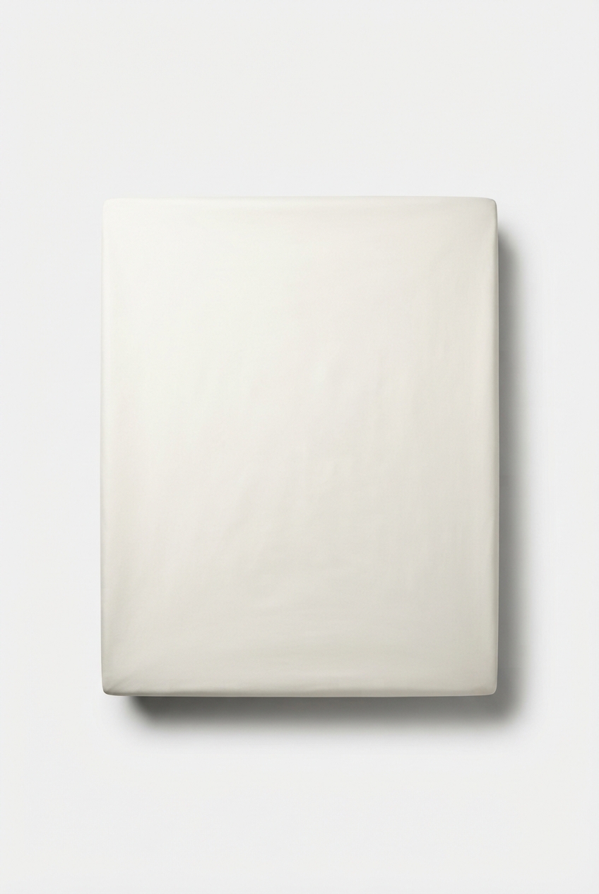 Ivory queen flat sheet folded neatly in a minimalist stack