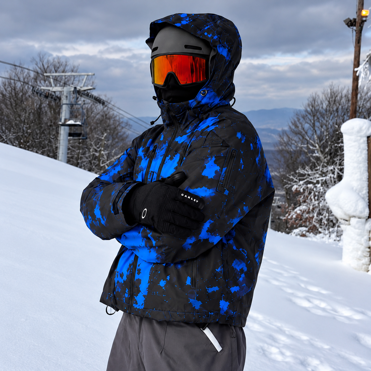 Arctic Blue snow-reactive jacket on the mountain