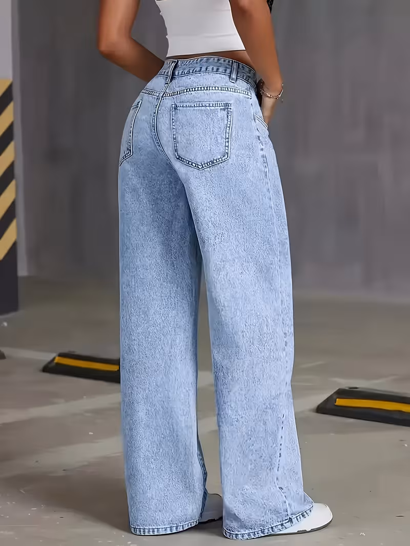 fashionable straight leg jeans for women that offer a relaxed and comfortable wide leg design light washed jeans come with pockets and are perfect for elegant occasions featuring a high waisted form fitting style Product details 3
