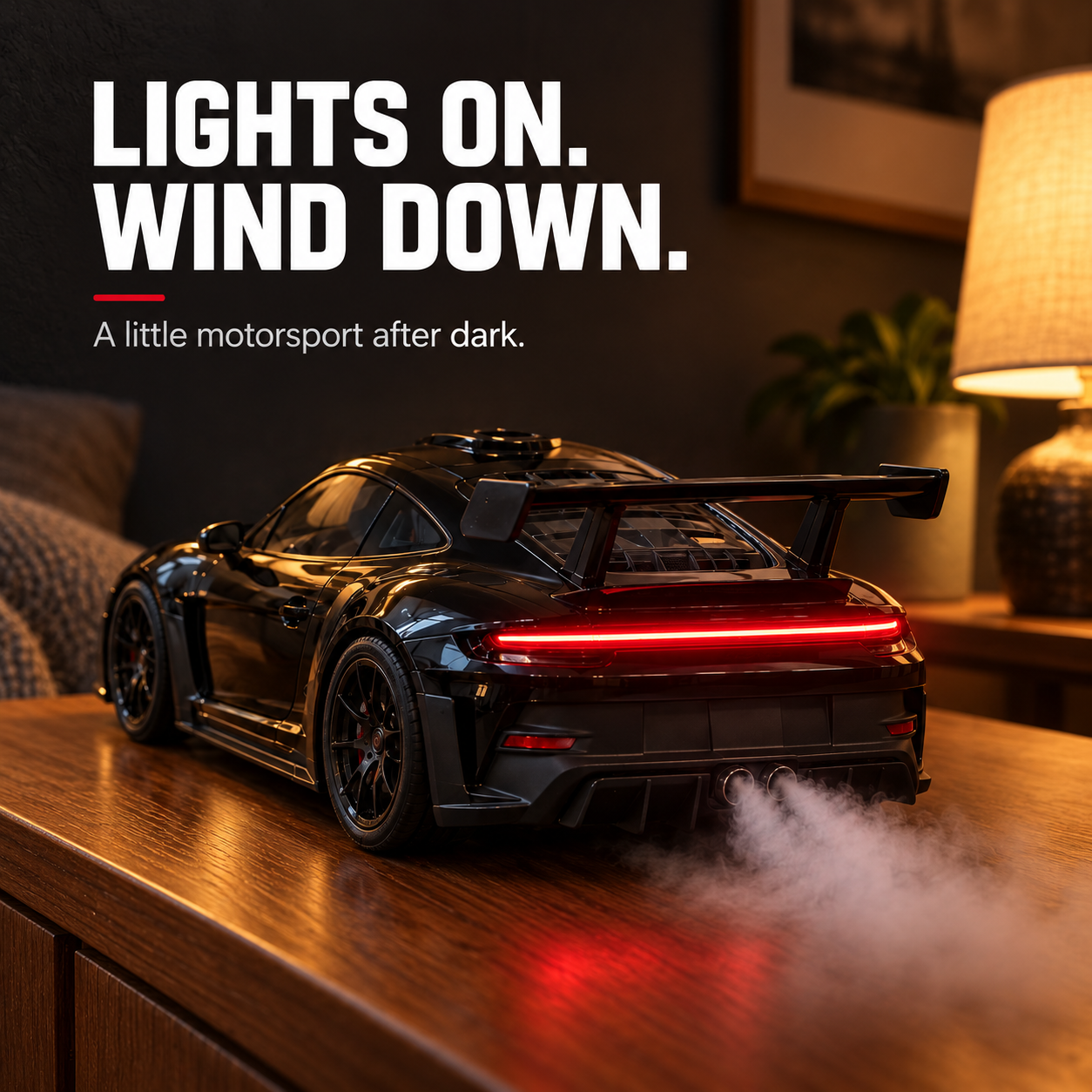 Black 911 GT3 RS diffuser with illuminated details in an evening setting
