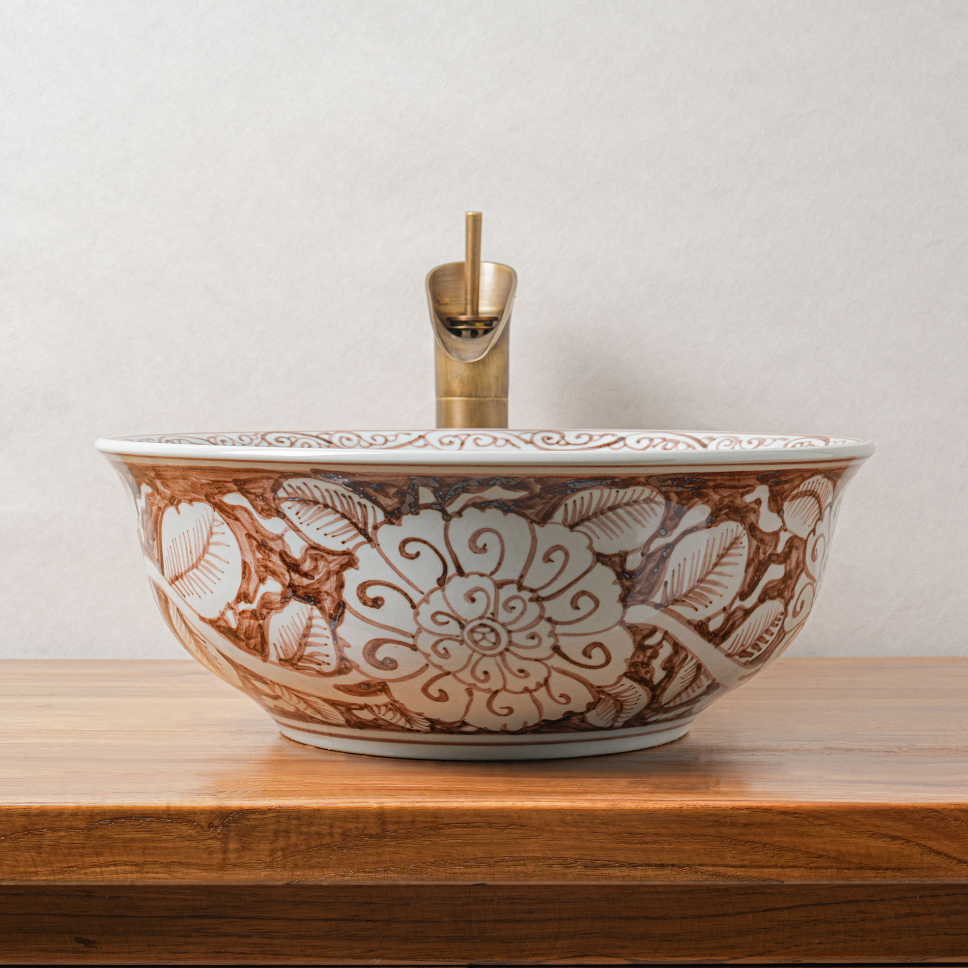 Round hand-painted ceramic washbasin