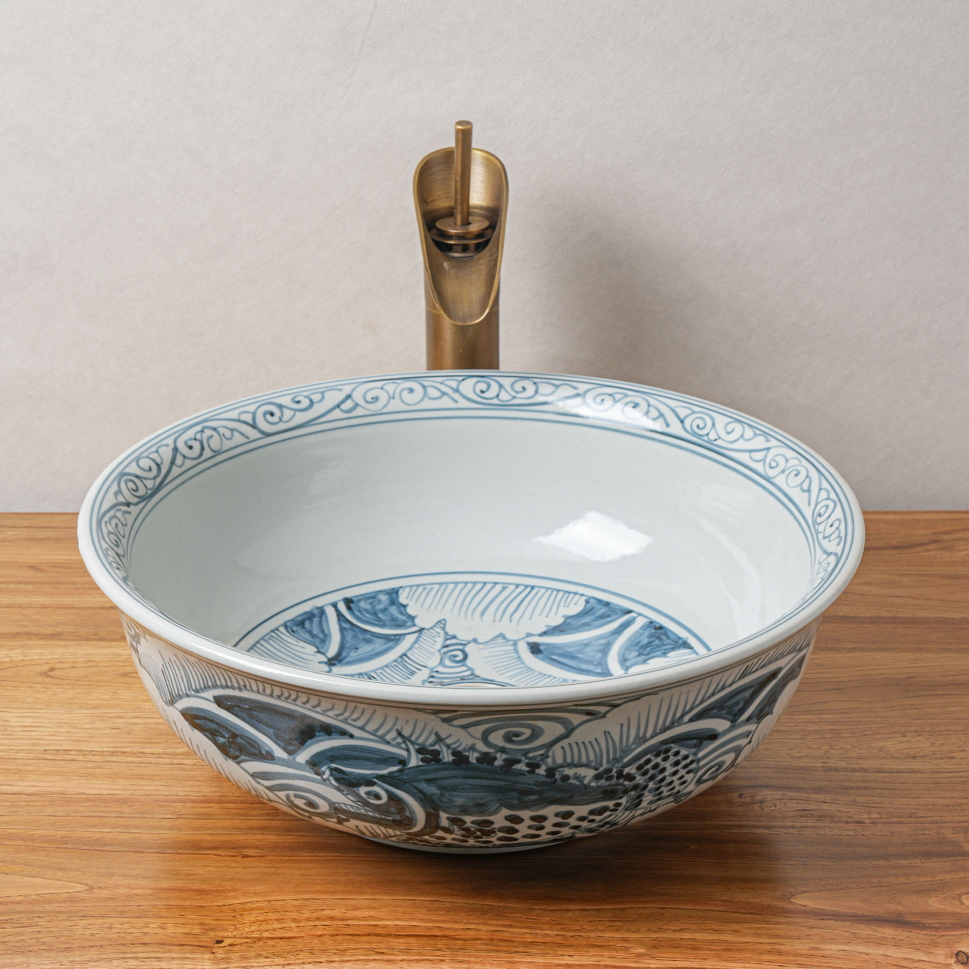 Round hand-painted ceramic washbasin