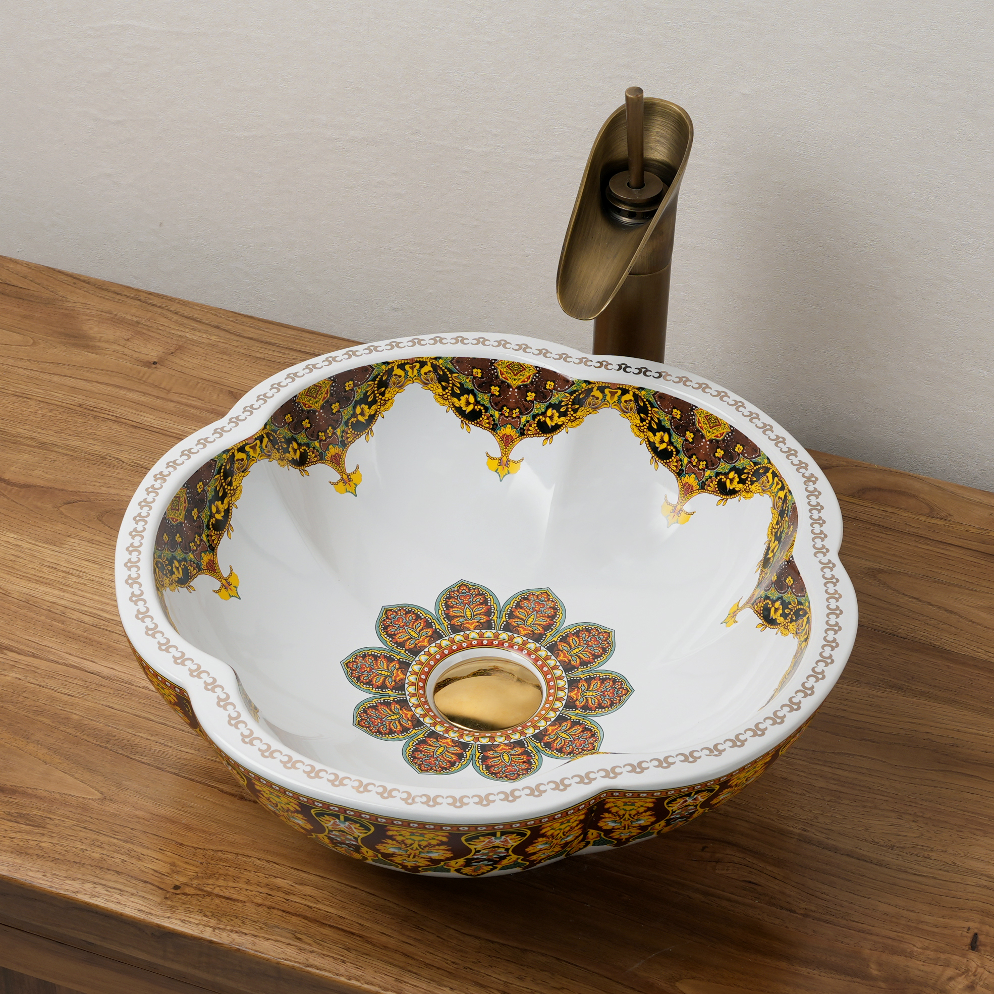 Ceramic washbasin with a yellow and white floral print