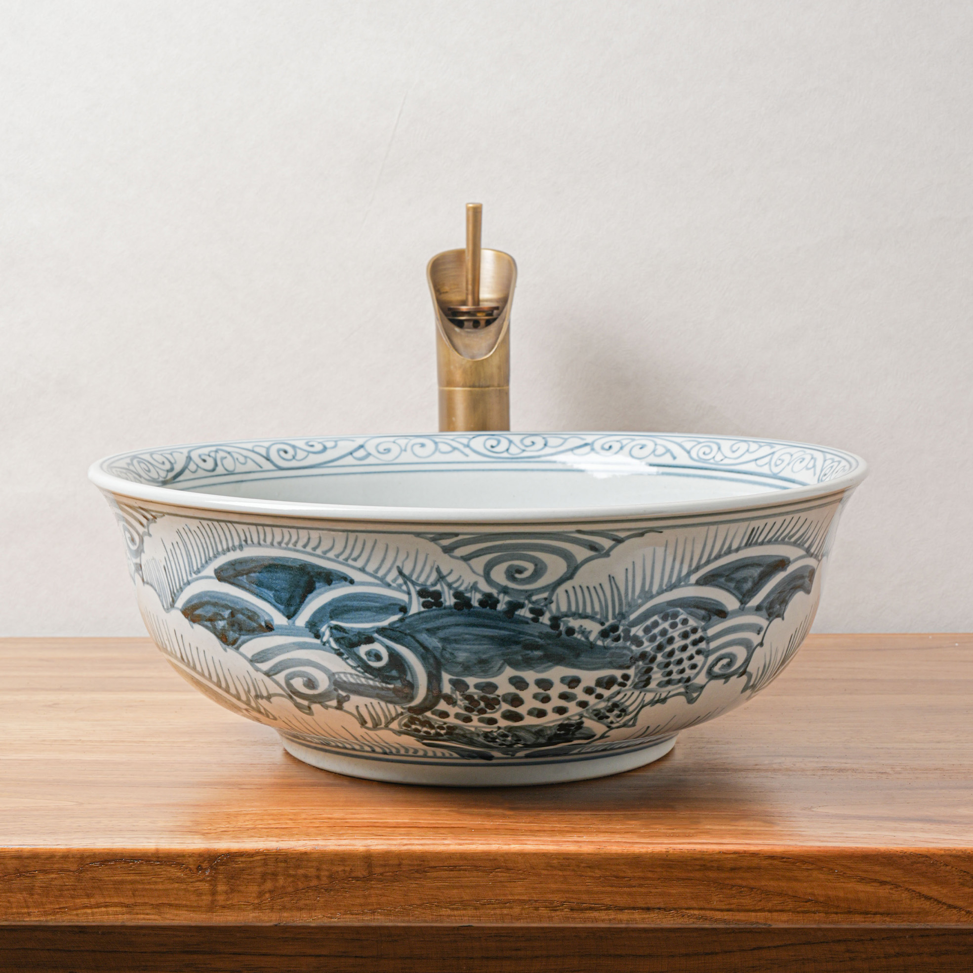Round hand-painted ceramic washbasin
