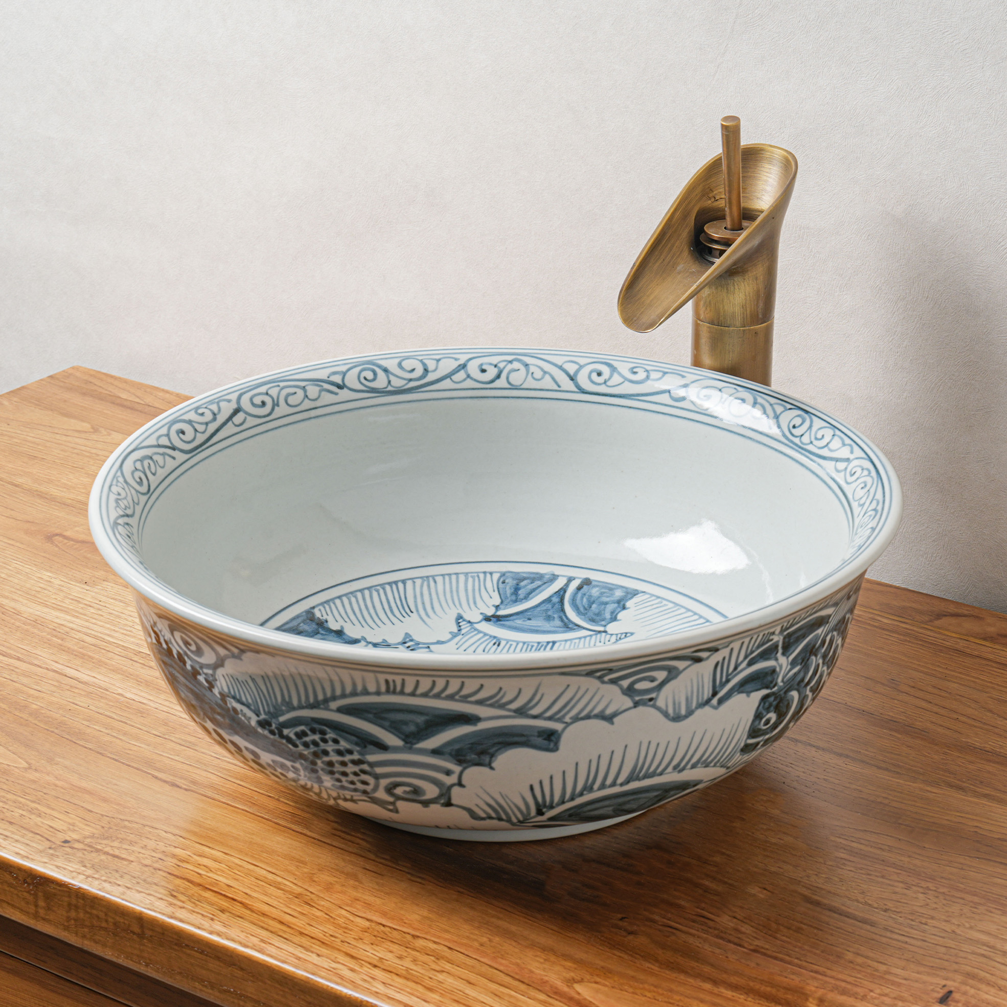 Round hand-painted ceramic washbasin